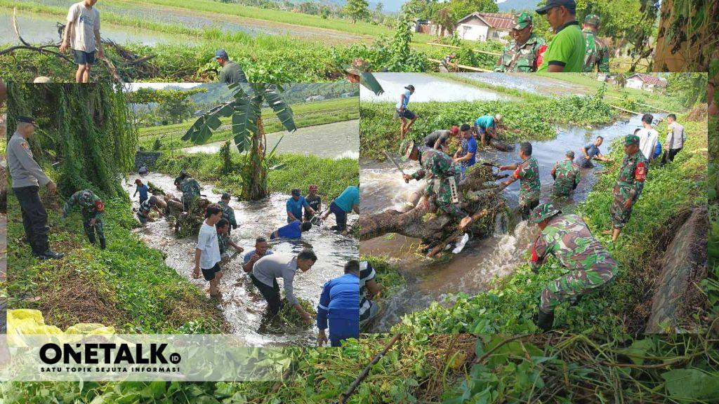 Gotong Royong Karya Bakti TNI Bersihkan Saluran Irigasi di Desa Tolite Jaya, Gorontalo Utara