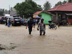 Kapten Inf Edy Sriyanto Pimpin Penanganan Banjir di Desa Jembatan Merah
