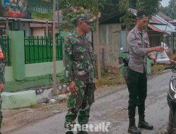 Sinergitas TNI-Polri di Sumalata, Berbagi Takjil, Eratkan Kebersamaan di Bulan Ramadan